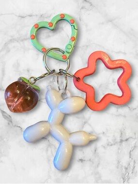 Playful Heart Clip Keychain with White Balloon Dog & Coral Flower Charm